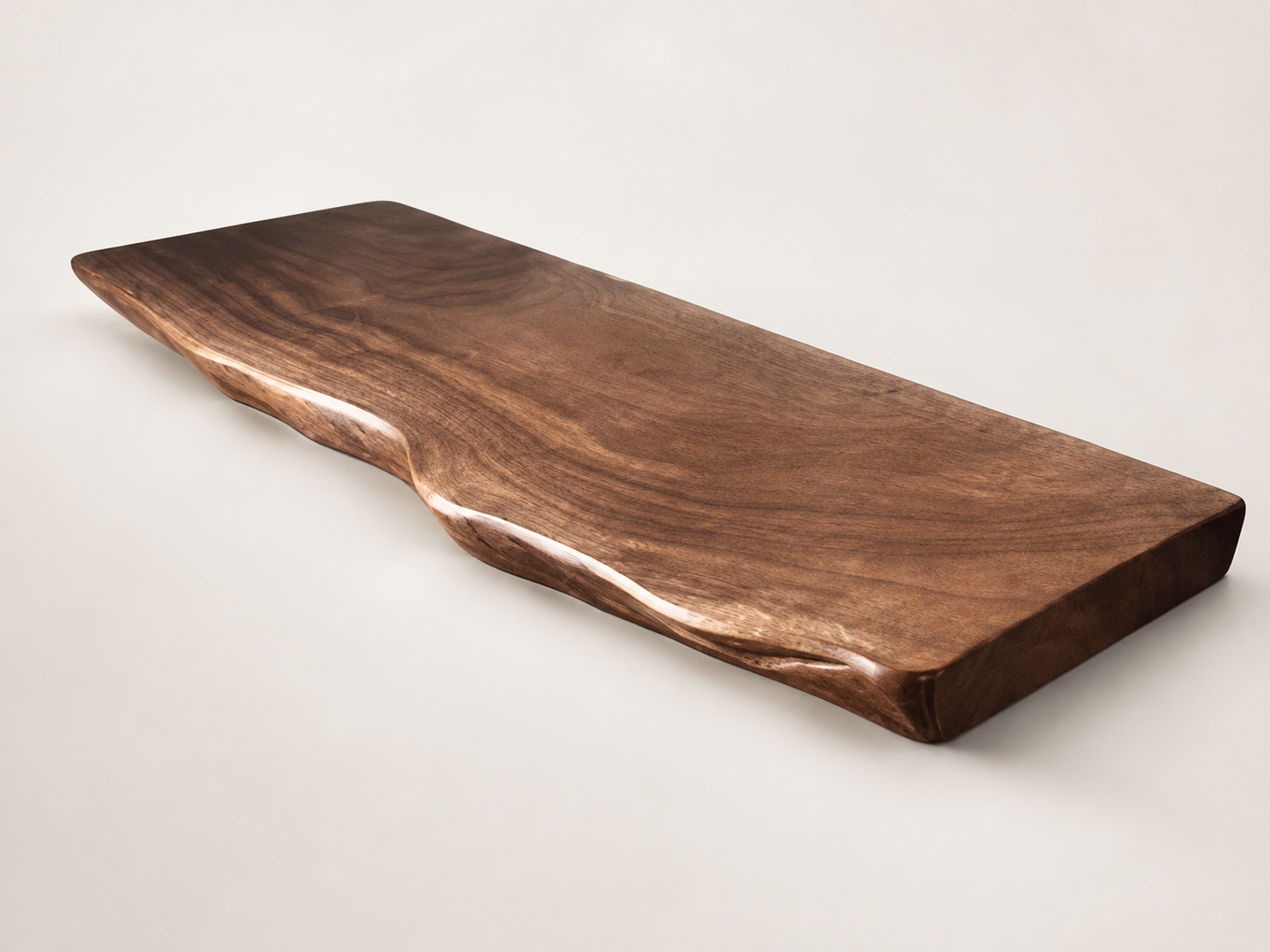 The founder-provided photo of a live-edge wood board used in our sample brief